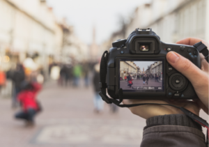 Camera captures bustling street scene.