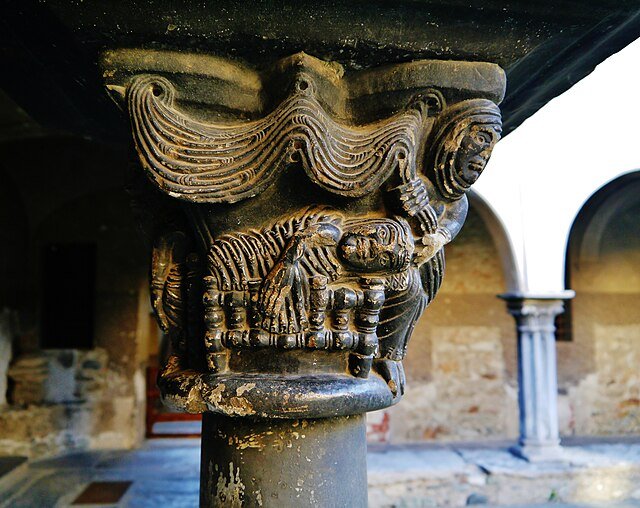 Romanesque capital depicting the Sacrifice of Isaac in the cloister of Sant’Orso